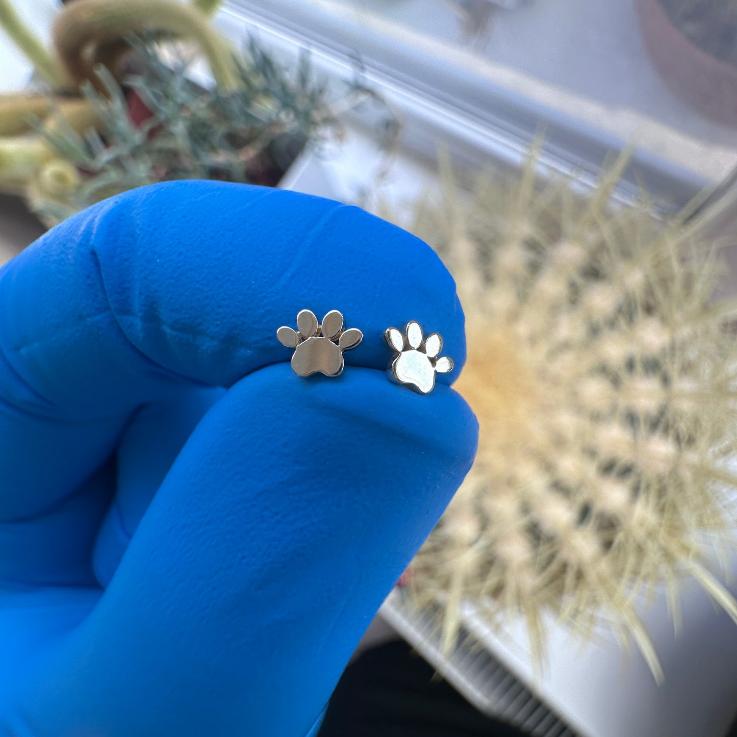 Gold dog paw