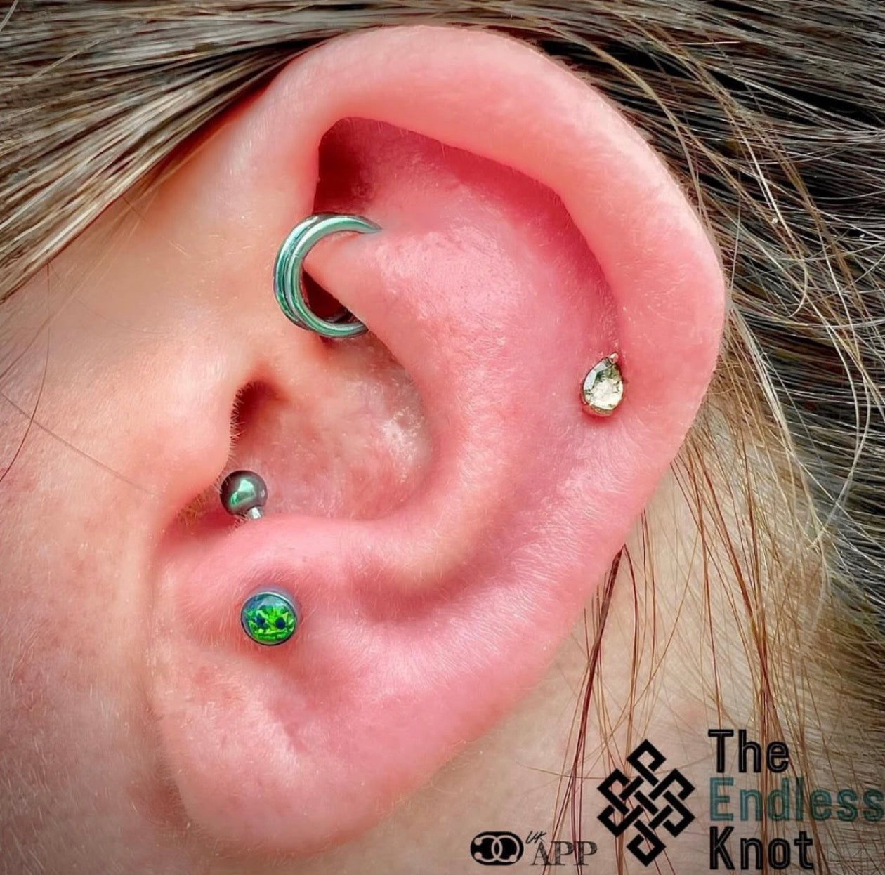 Curved barbell in ear