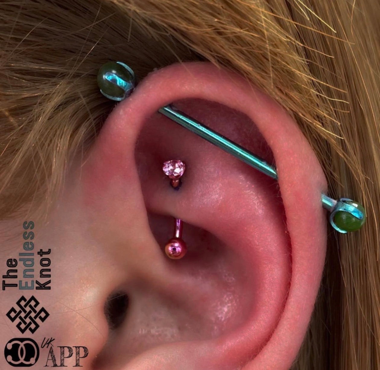 Curved barbell in ear